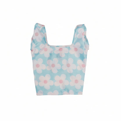Compact tote bag with a pattern of white daisies on a light blue background.