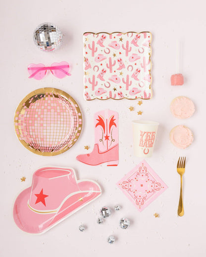 Celebrate with Pink boot-shaped napkins and other party decor