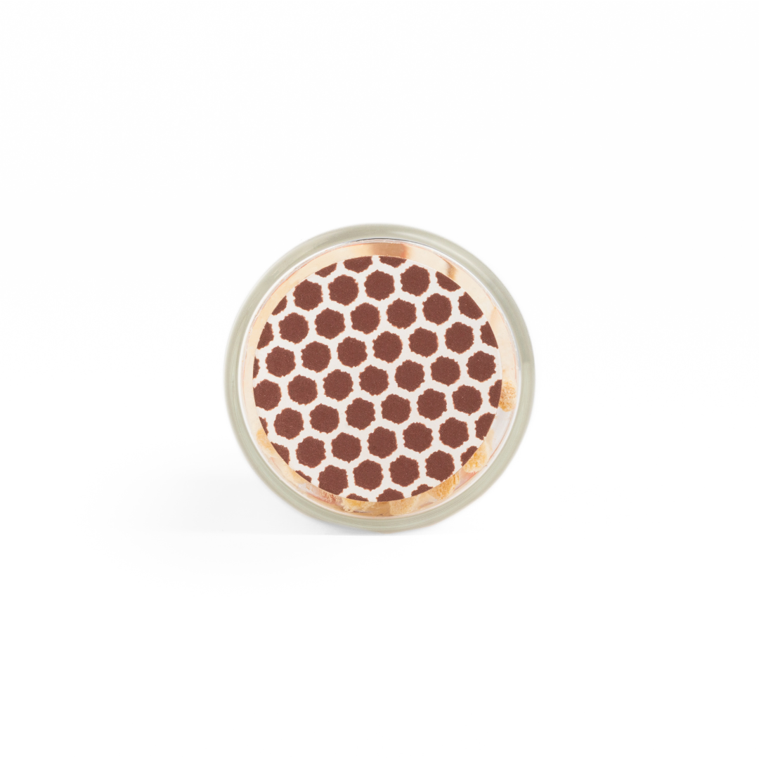 Pastel-colored matchsticks in a corked glass vial with an adhesive match striker at the bottom. Bottom image. 