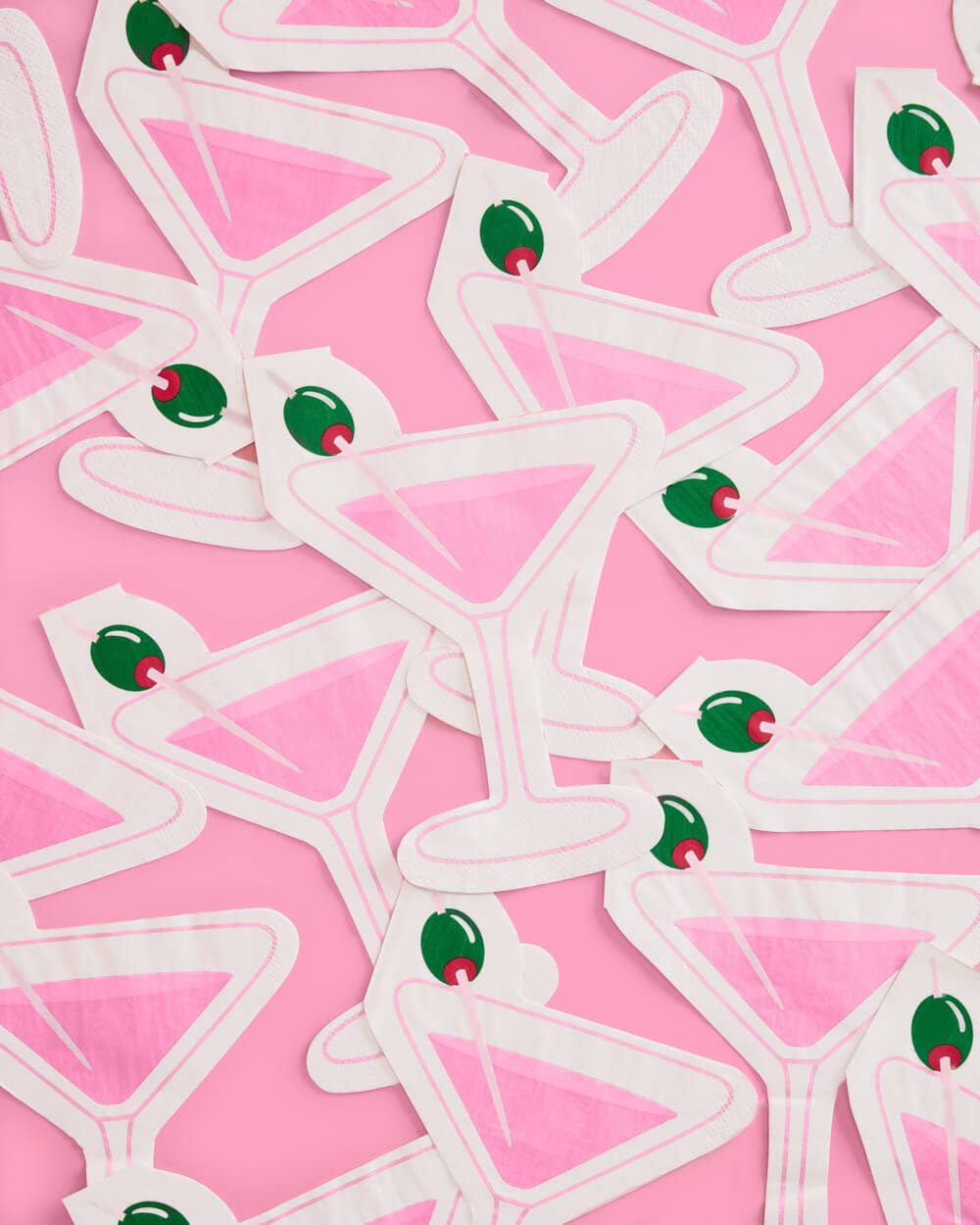 "Extra Dirty" martini-themed paper napkins with a printed pink martini glass and green olive, perfect for cocktails, birthdays, and celebrations.