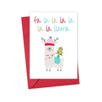 Close-up of funny llama Christmas card with festive red envelope
