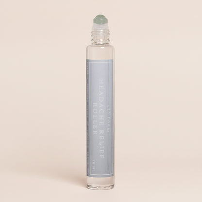 Roll-on bottle with a white cap on a white background