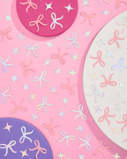Tying the Knot confetti with pink bows and iridescent foil sparkles for bridal celebrations and gift boxes