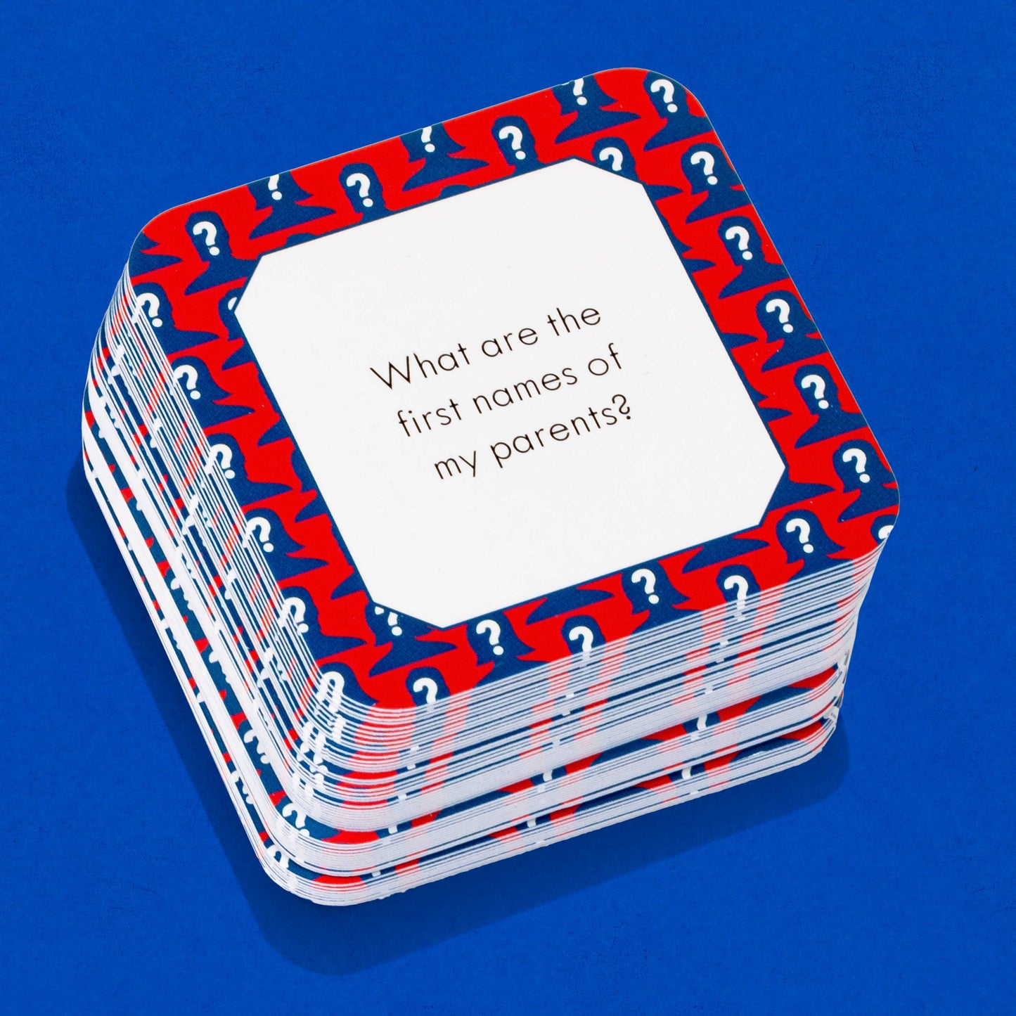 Stack of cards with a question on a blue background