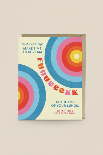 Card with colorful concentric circles and humorous text on a beige background