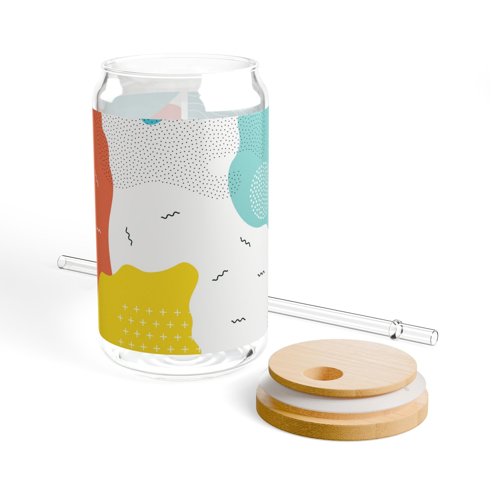 Close up of the 16oz sipper glass with abstract design, bamboo lid, and Tritan straw