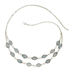 Necklace with light blue stone pendants on a white background