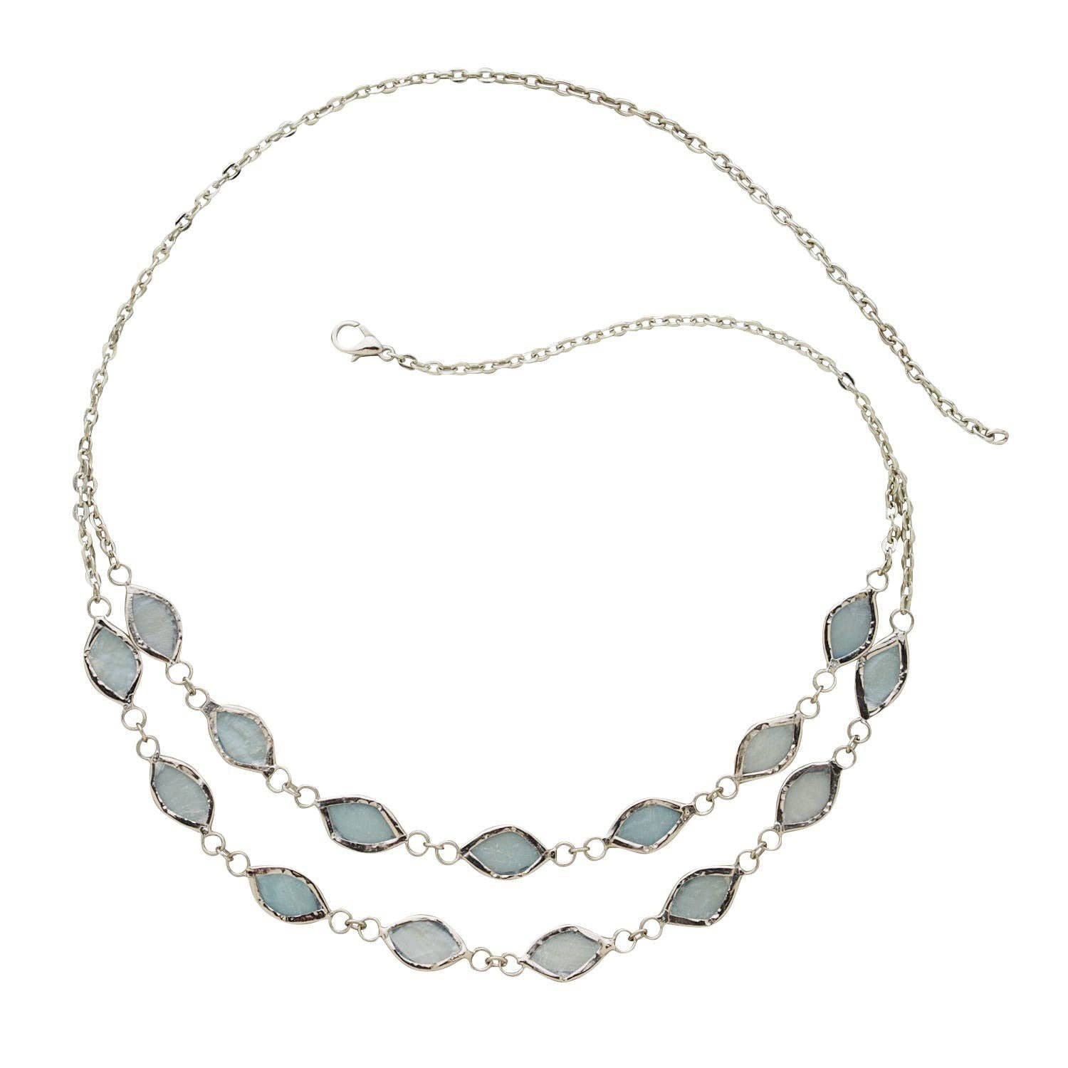 Necklace with light blue stone pendants on a white background