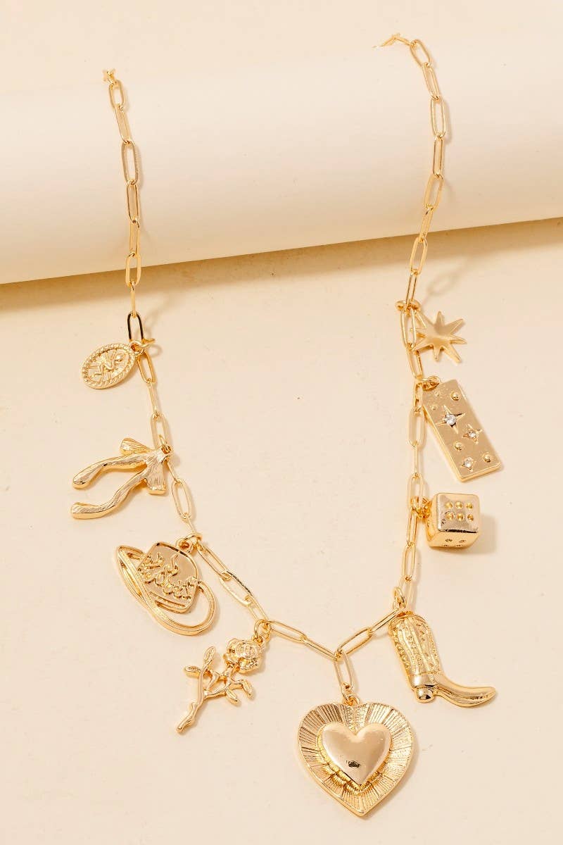 Close-up of multi-heart charm necklace with vintage western vibes