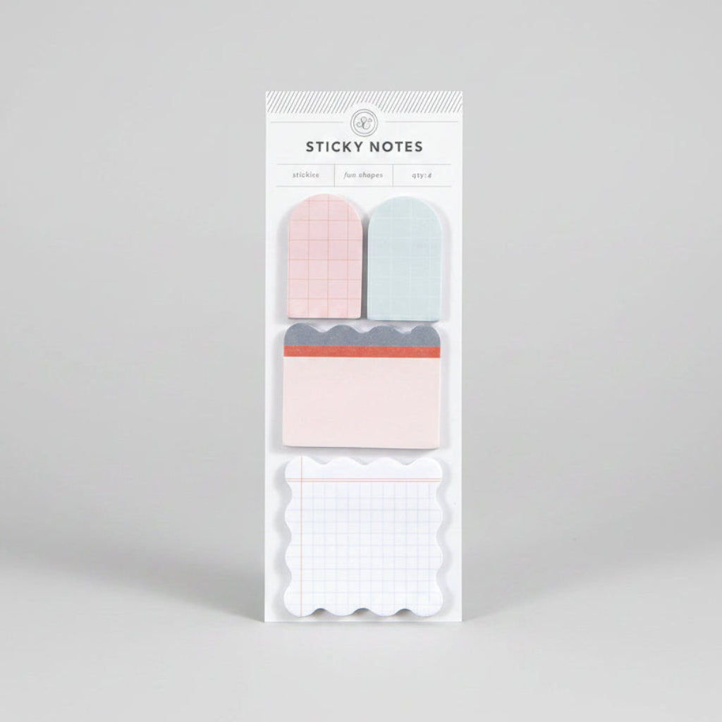 Pack of colorful sticky notes showcased on a light beige background