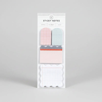 Pack of colorful sticky notes showcased on a light beige background