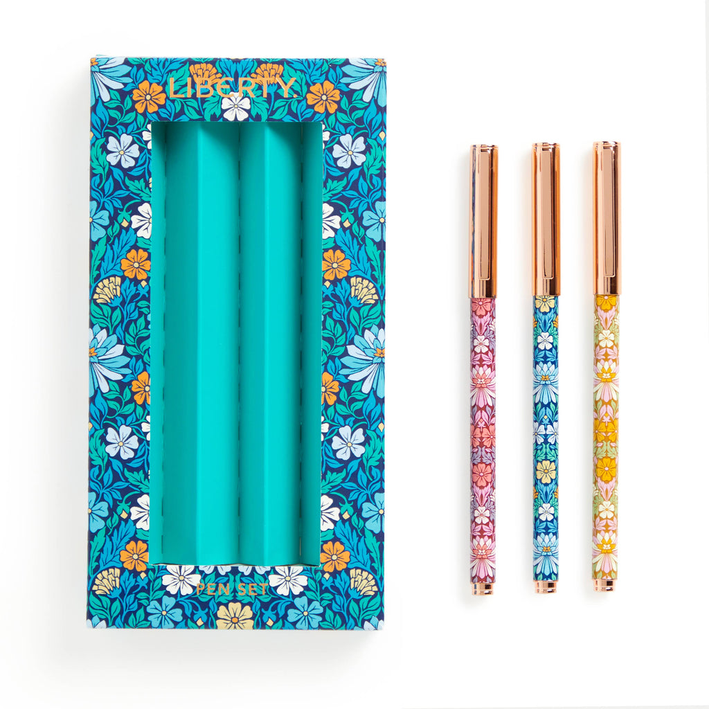 Close-up of Liberty London floral prints on the pen barrels 
