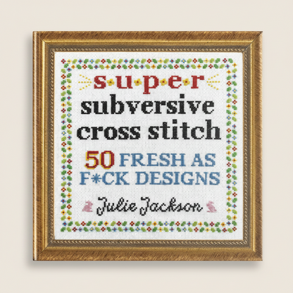 Framed cross-stitch pattern with colorful text on a white background