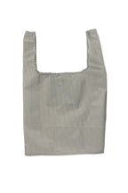 Black and white striped reusable tote bag, BRNG Vickie Daily Shopper unfolded and open on a white background.