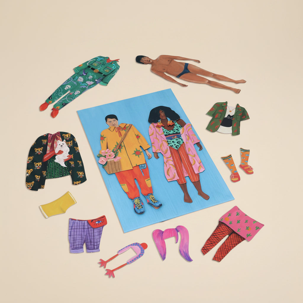 Colorful magnetic dolls with vibrant and colorful clothing on a white background