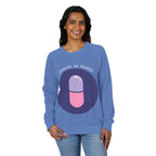Woman wearing a blue sweatshirt with a graphic design and text on a white background