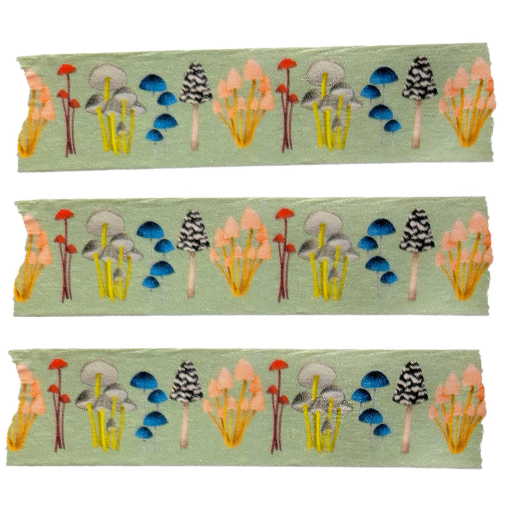 Three strips of fabric with colorful forest pattern on a green background