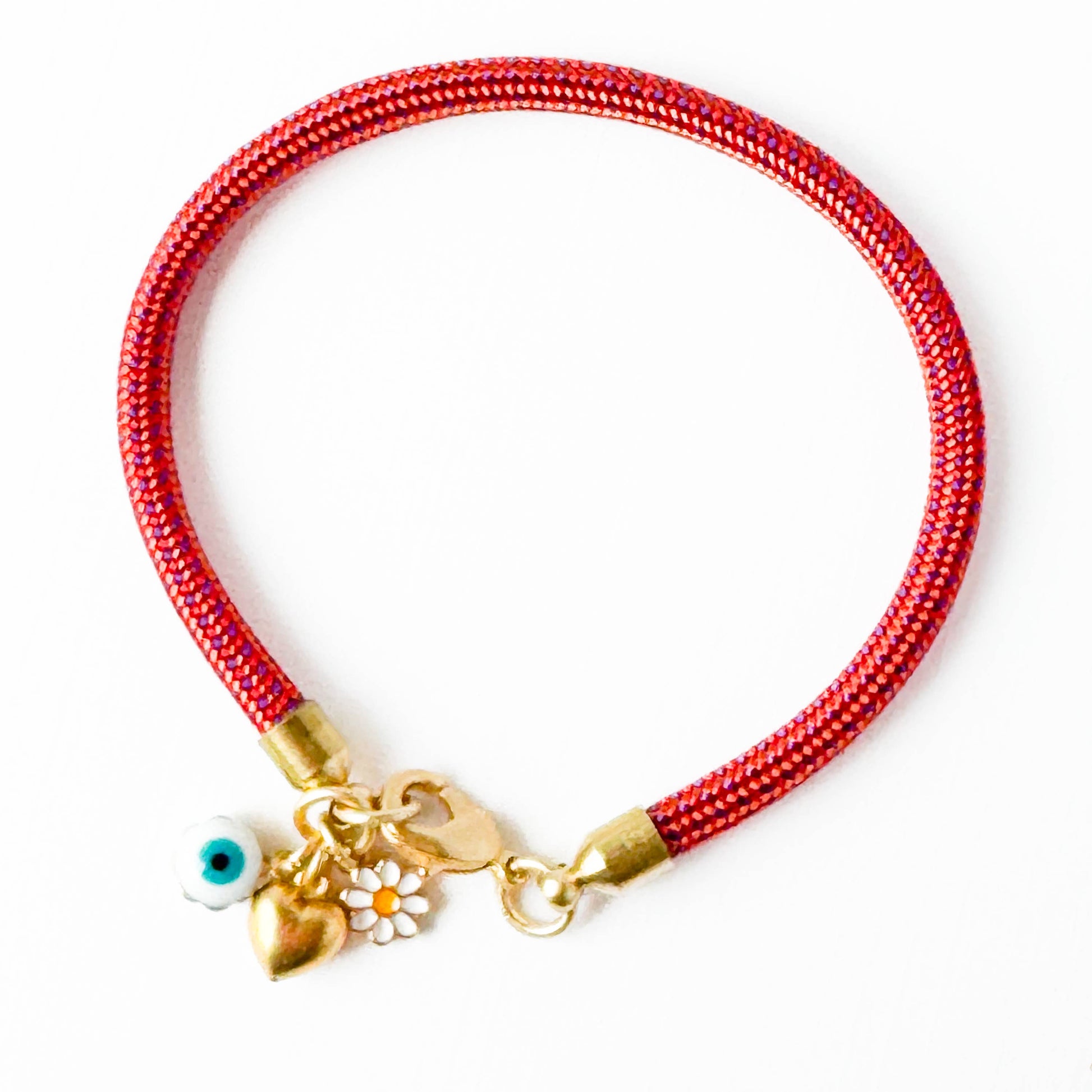 Detail of paracord texture and charm arrangement