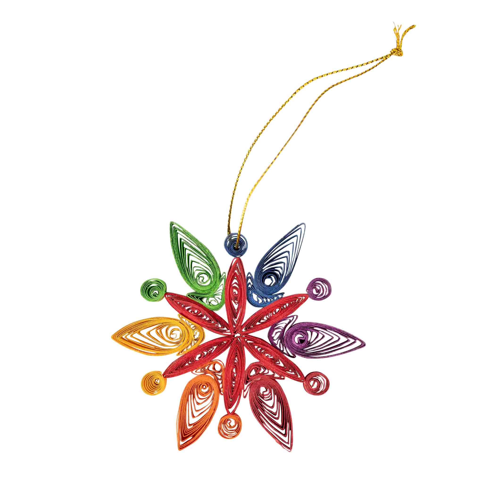 Colorful paper snowflake ornament on a white background