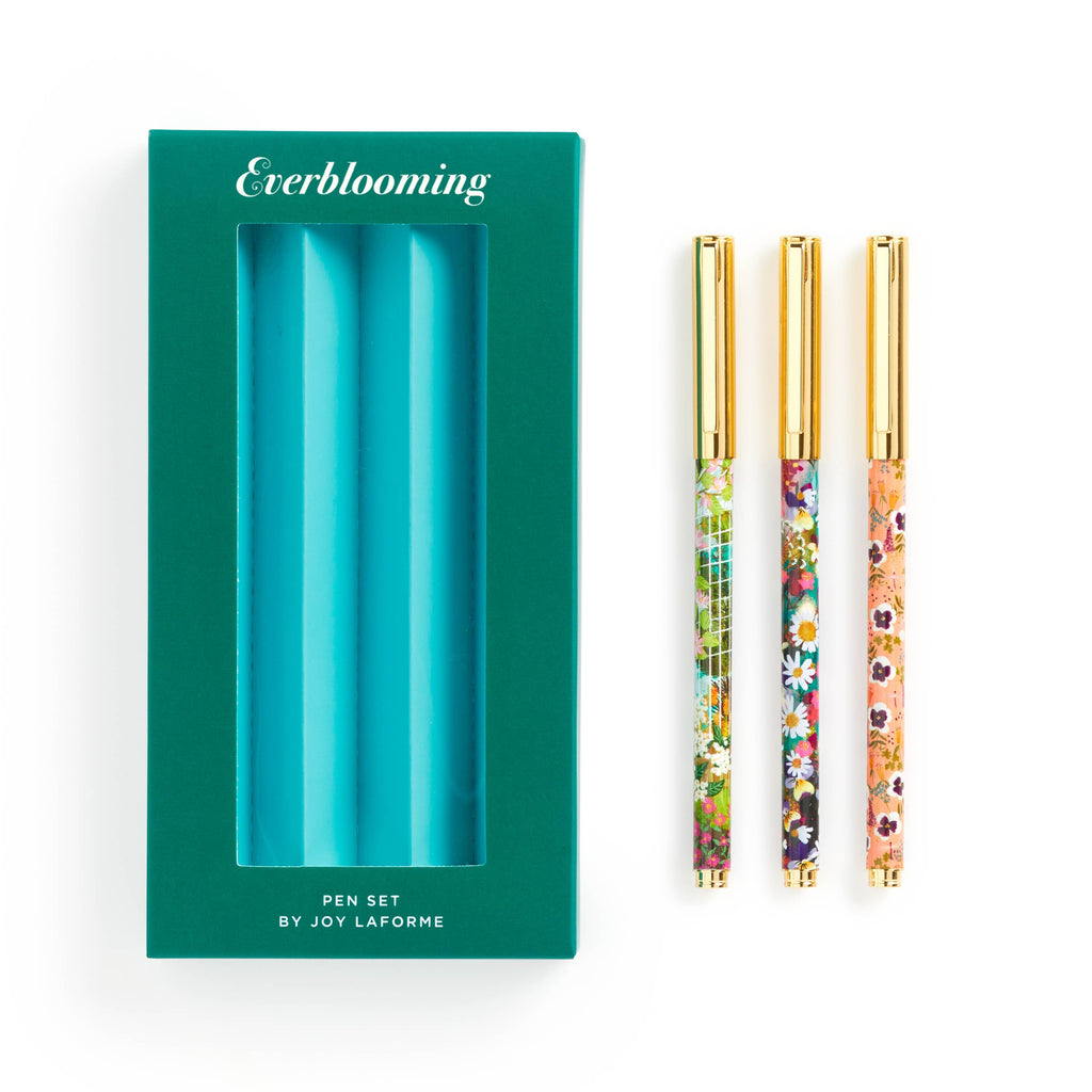 Open reusable box showing all three pens nestled in packaging with artistic floral detailing