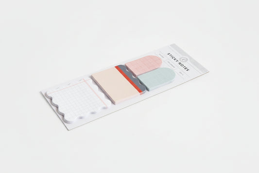 Pack of colorful sticky notes with a white background