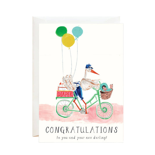 Illustrated stork riding a bicycle with balloons and a basket