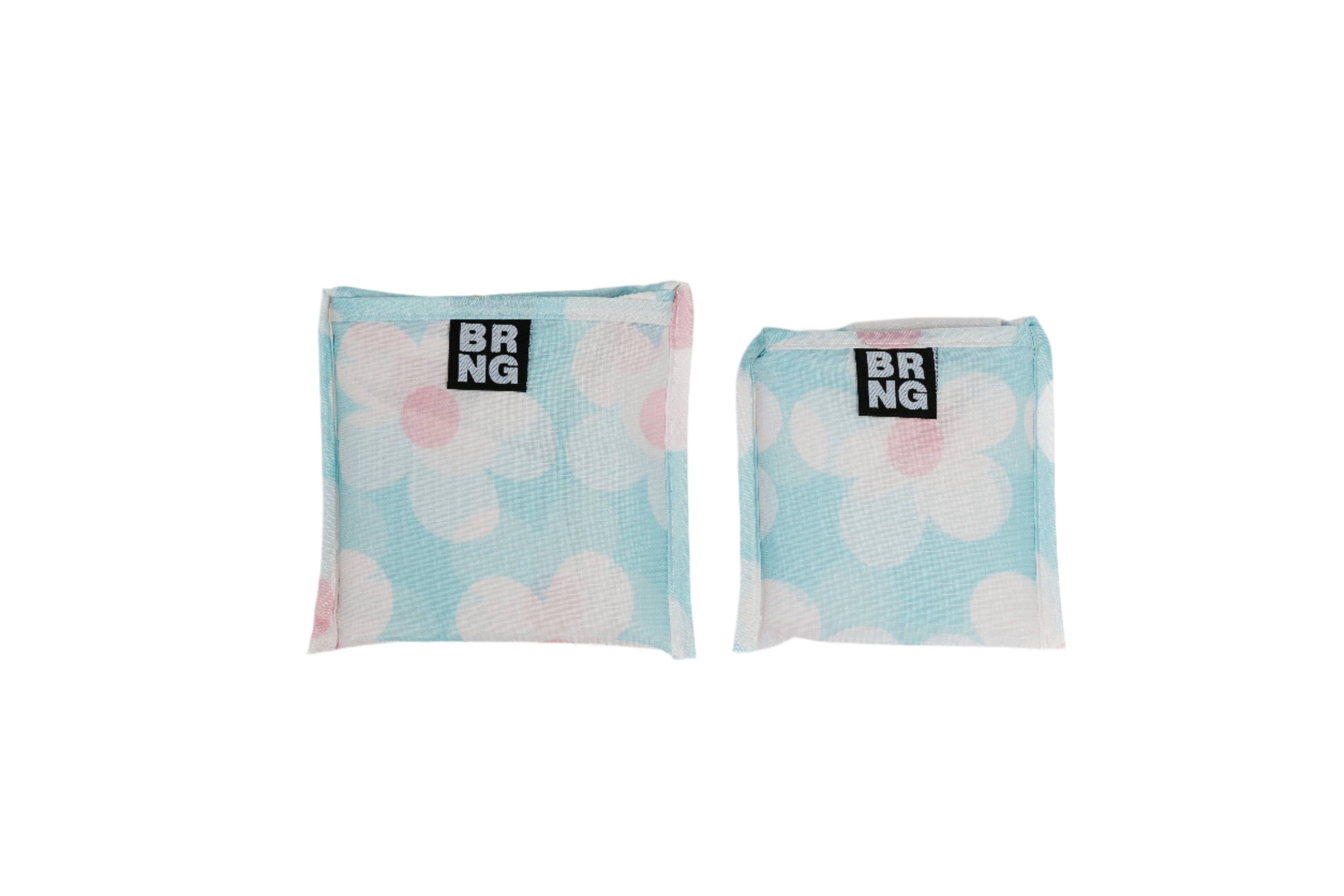 Close up of the Dolly Daily Shopper Mini and Regular size.