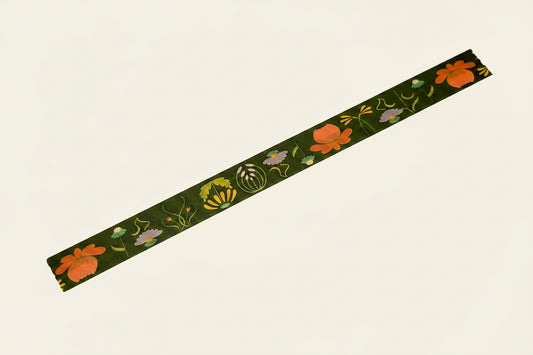 Decorative tape with floral design on a white background