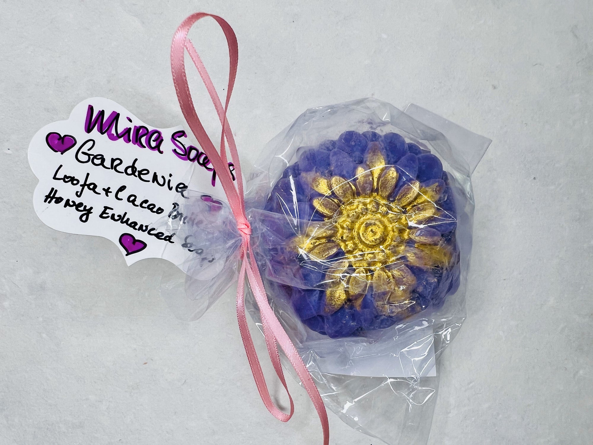 Gardenia-scented soap bar with gold detailing