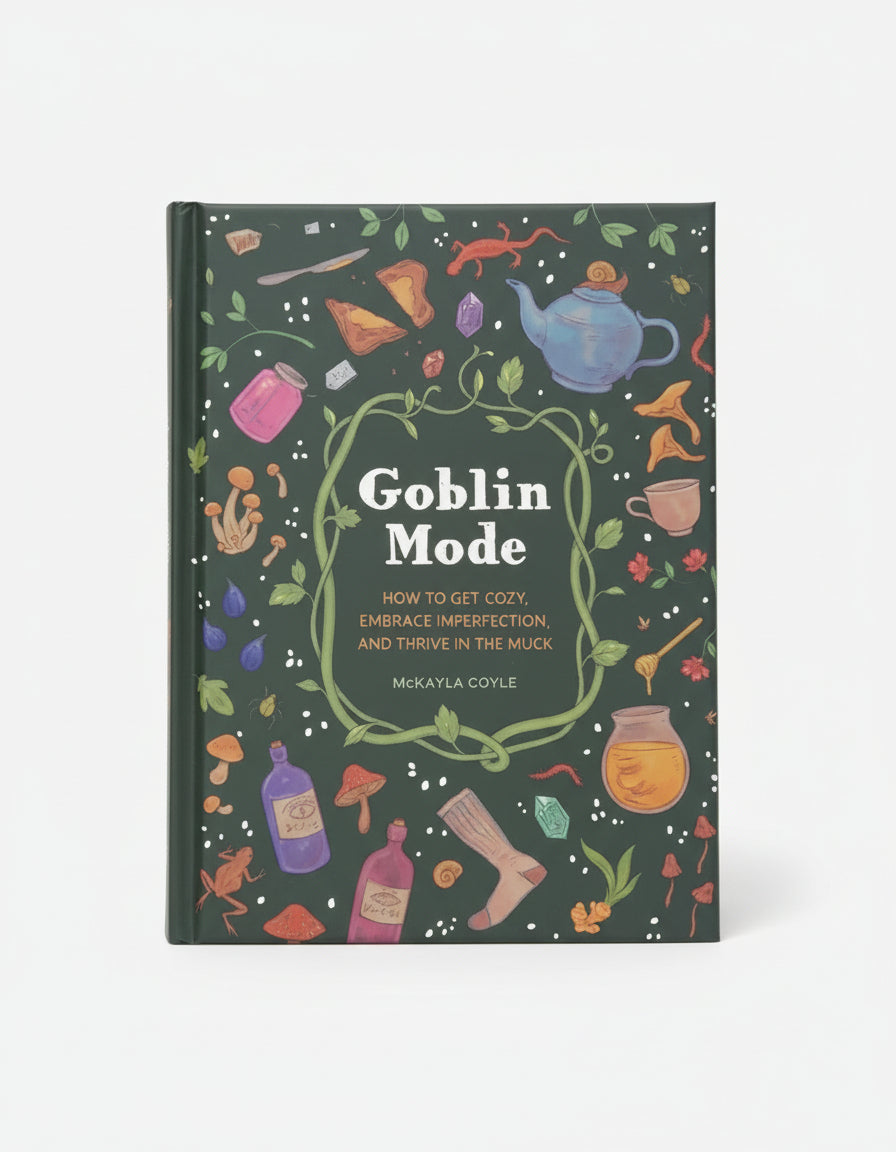 Book titled 'Goblin Mode' with colorful illustrations on a dark green background