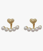 Gold heart and pearl huggie earrings styled for bridal wear
