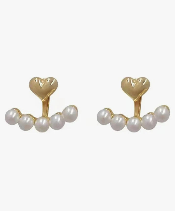 Gold heart and pearl huggie earrings styled for bridal wear