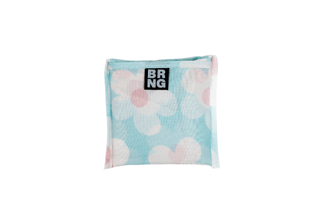 Close up of Hello Dolly Shopper from BRNG Bag folded up on a white background