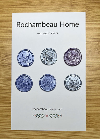 Close up view of the Skull & Crossbones wax seal stickers in a purple theme
