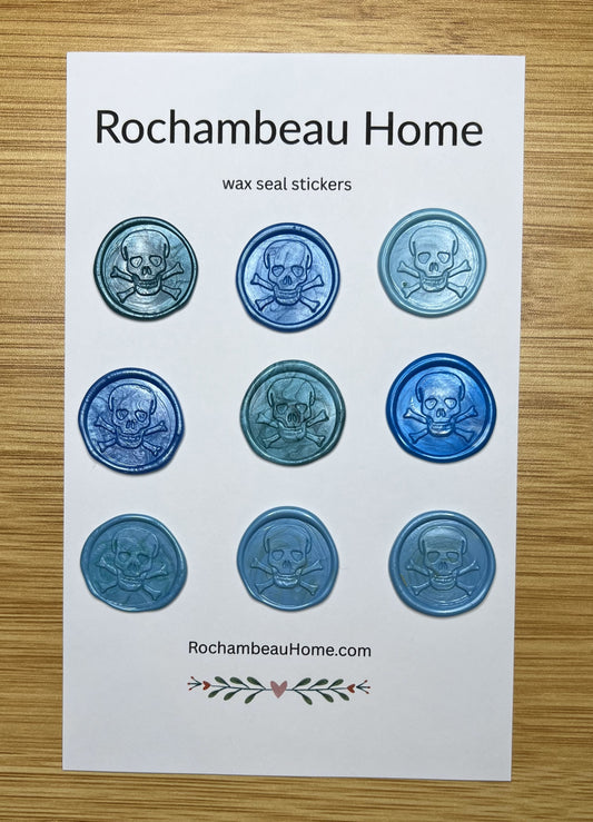 Close up view of the Skull & Crossbones wax seal stickers in a blue theme