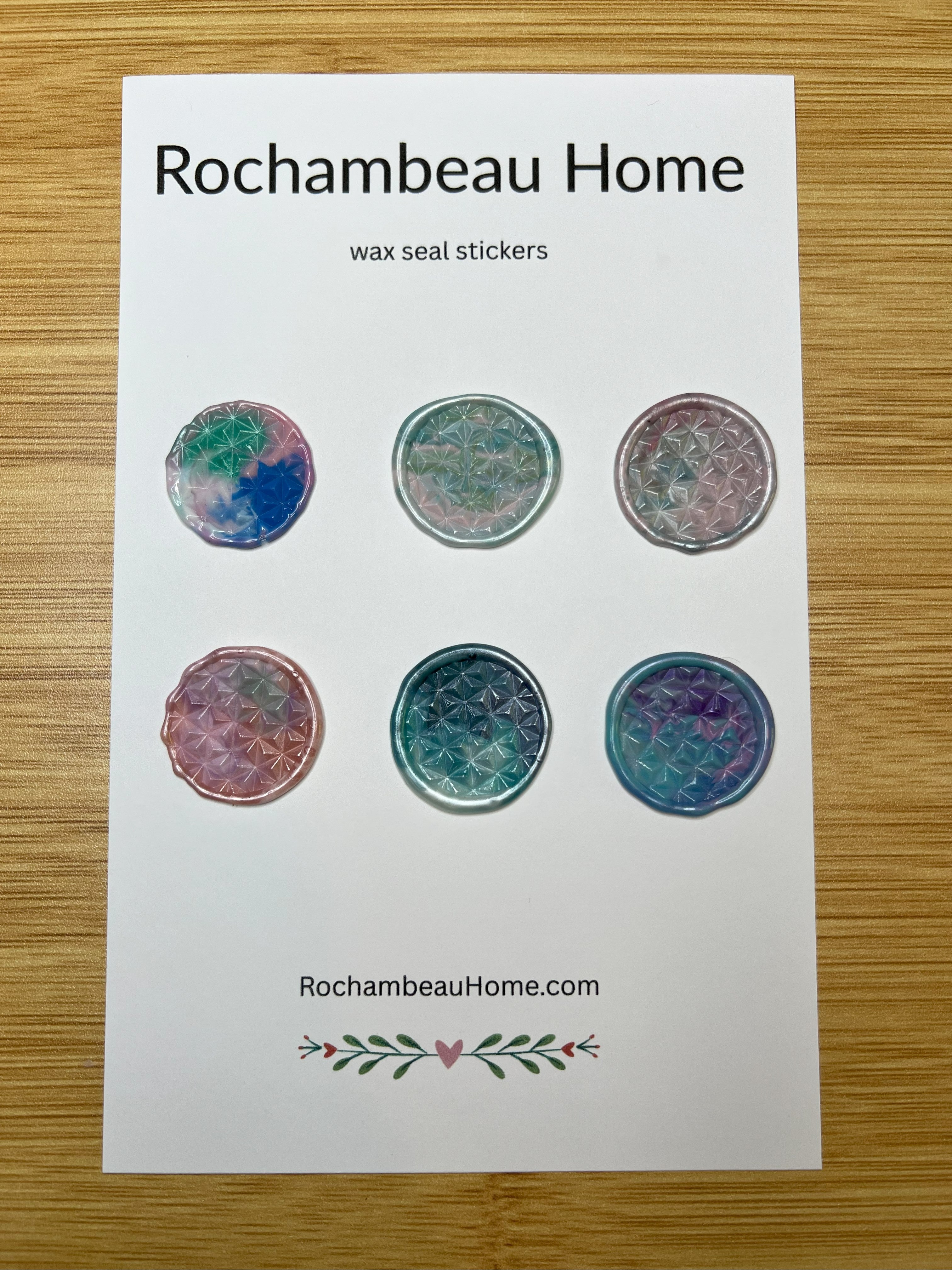 Close up view of the Prism Daze Wax Seal Sticker on a 6 Pack Card