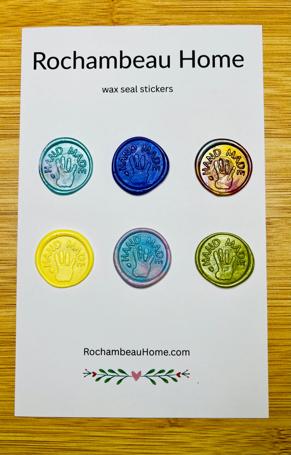 Multicolor “Hand Made” wax seals with 3D embossed handprint displayed on a product card