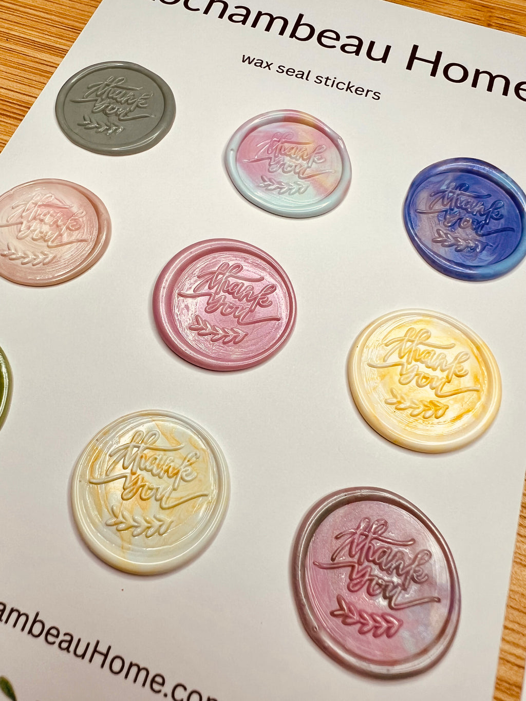 Side view of Style 2 "Thank you" wax seal stickers in various colors