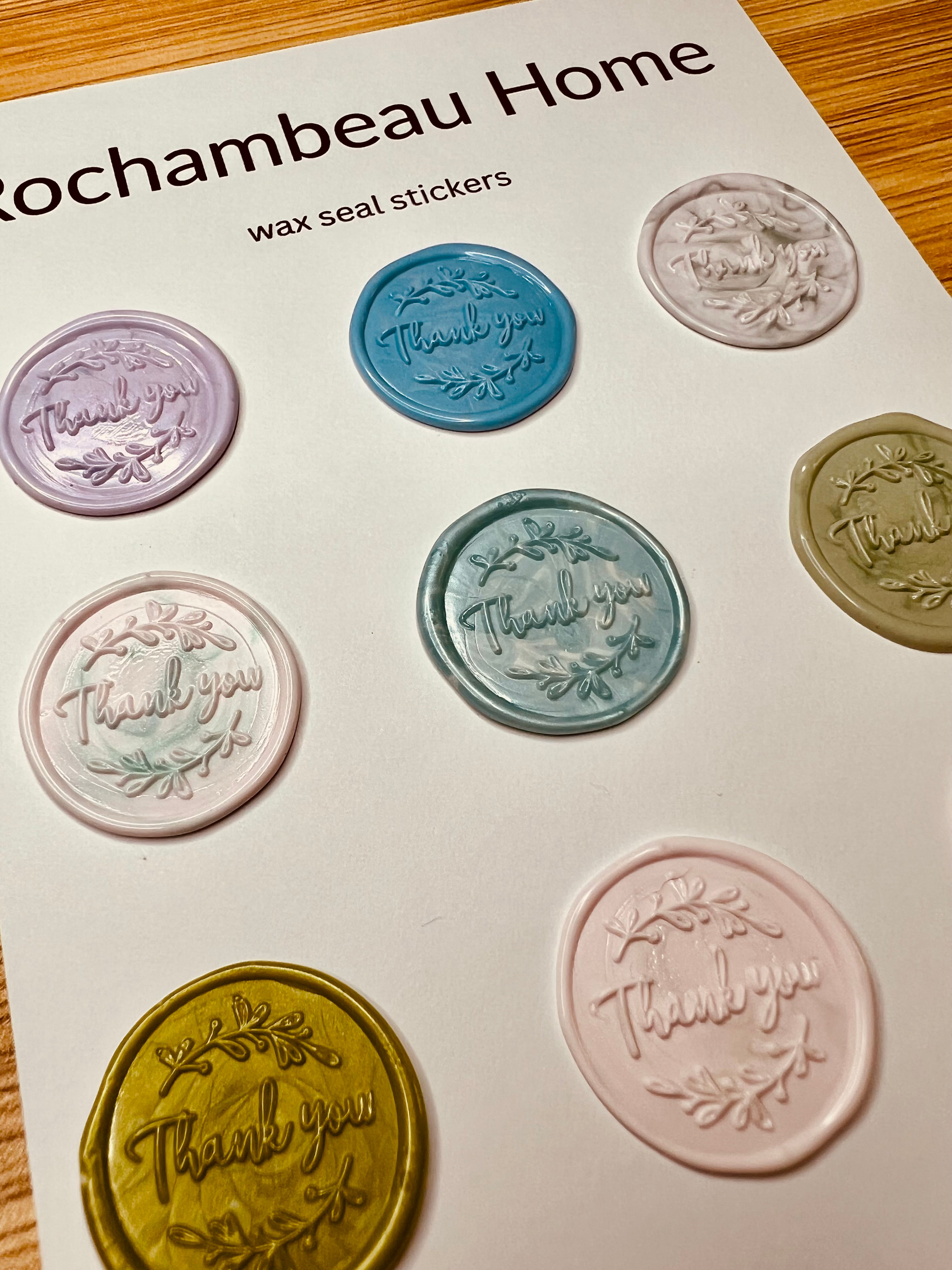 Side view of the "Thank You" (Style 1) wax seal stickers in a variety of colors 