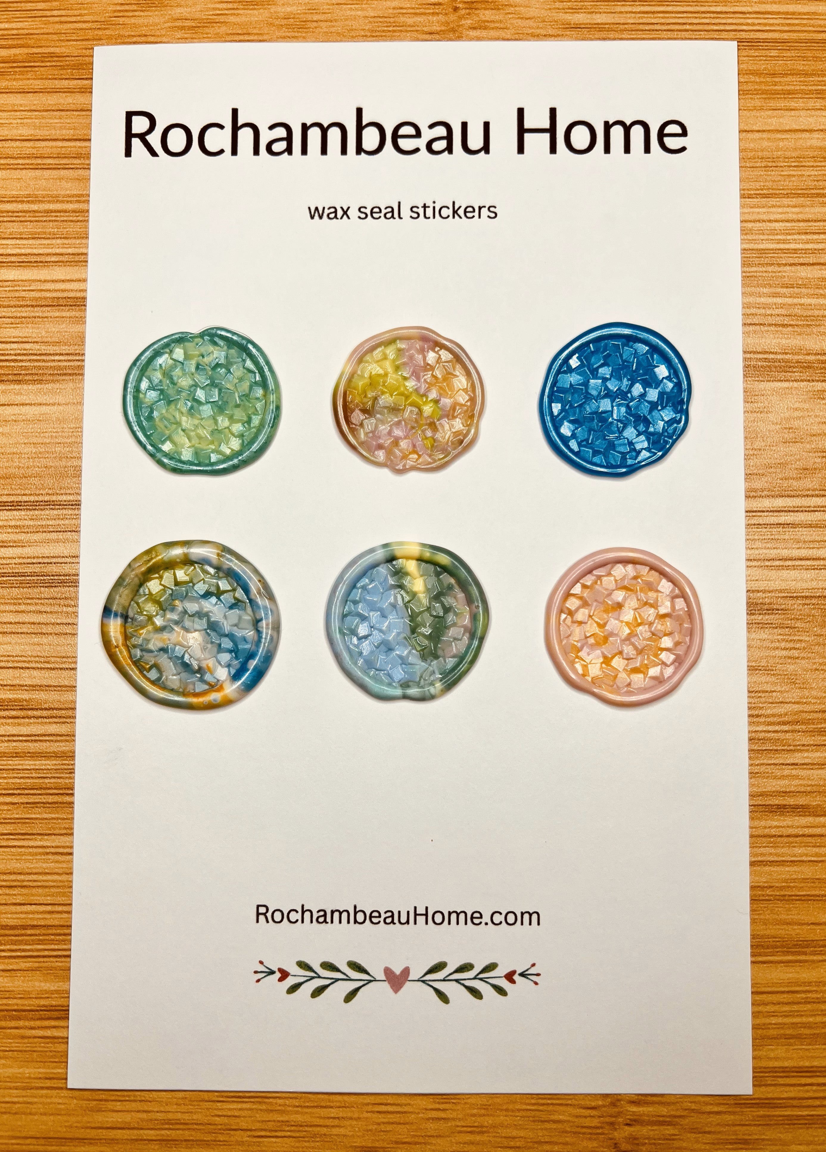 Close up view of the Rock Candy wax seal stickers on a 6 pack card