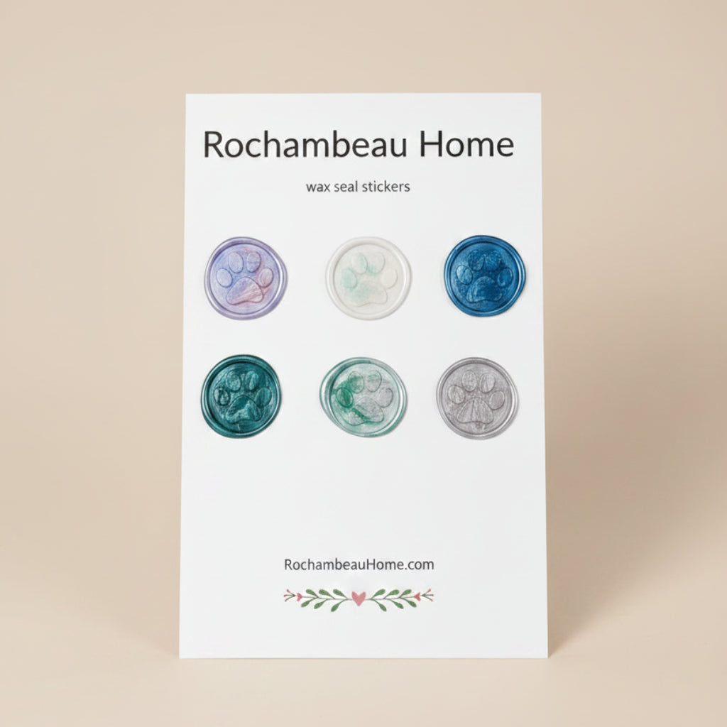 6 multicolor paw print wax seal stickers created by Rochambeau Home arranged on a display card