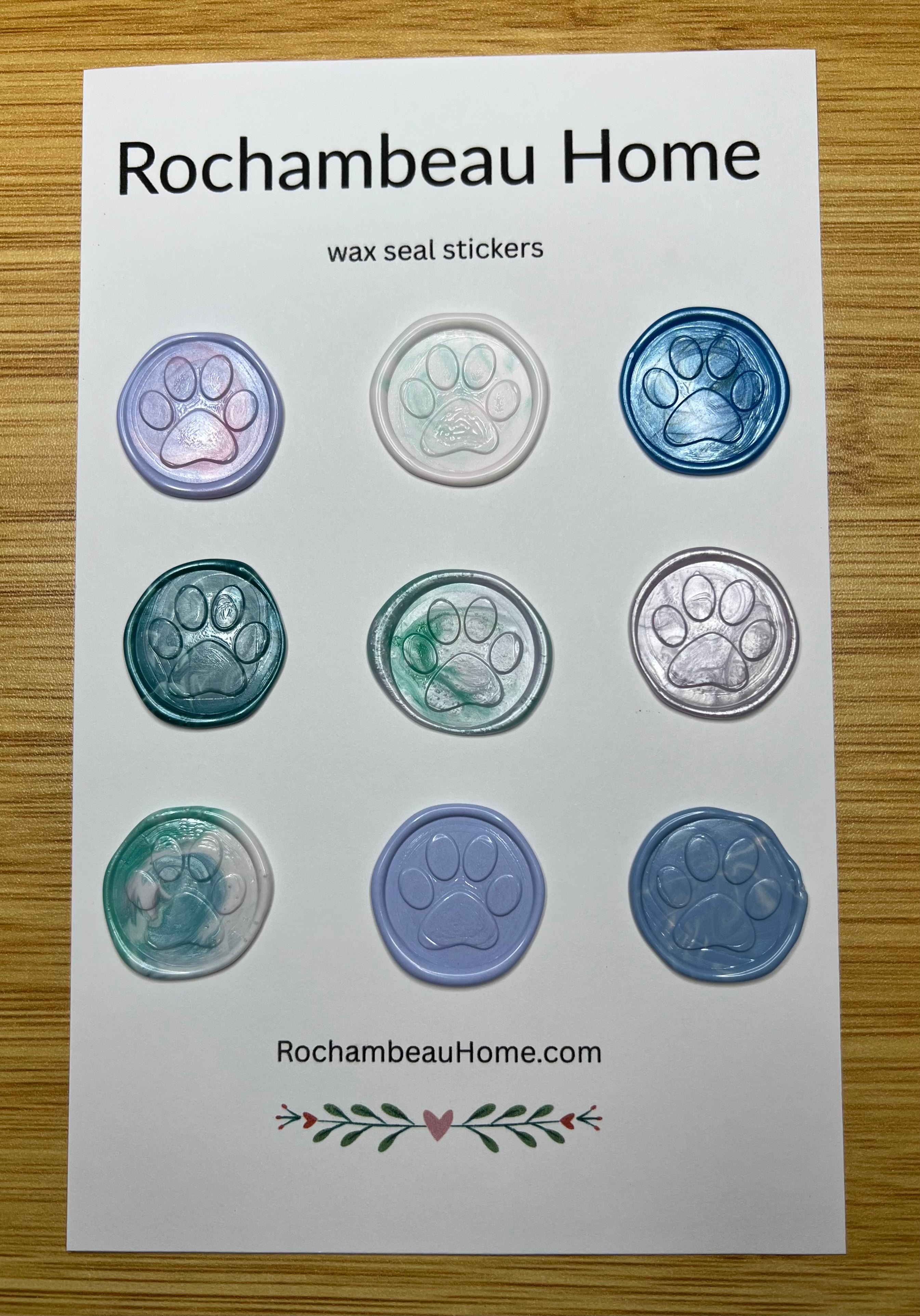 Close-up of 9 embossed paw print in hand-poured wax with natural texture