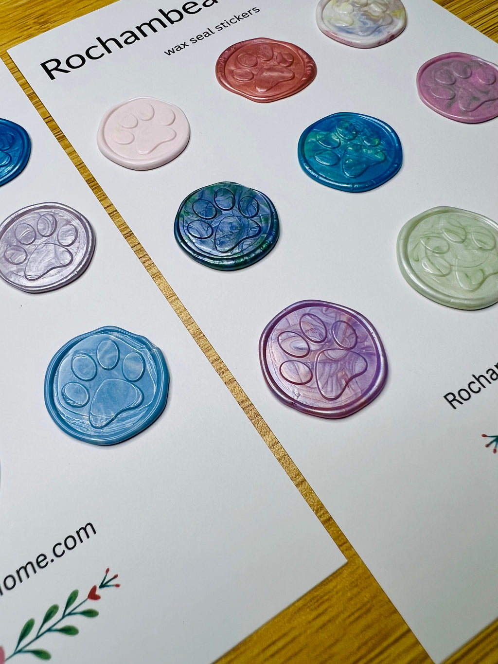 Side view of the paw print wax seal stickers showcasing the embossed paw print