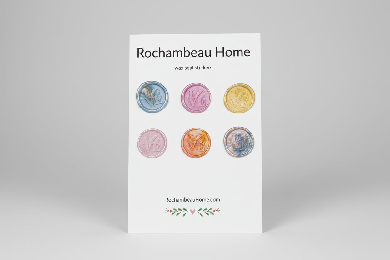 Multicolor wax seals featuring the iconic LOVE lettering created by Rochambeau Home