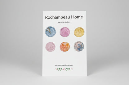 Multicolor wax seals featuring the iconic LOVE lettering created by Rochambeau Home