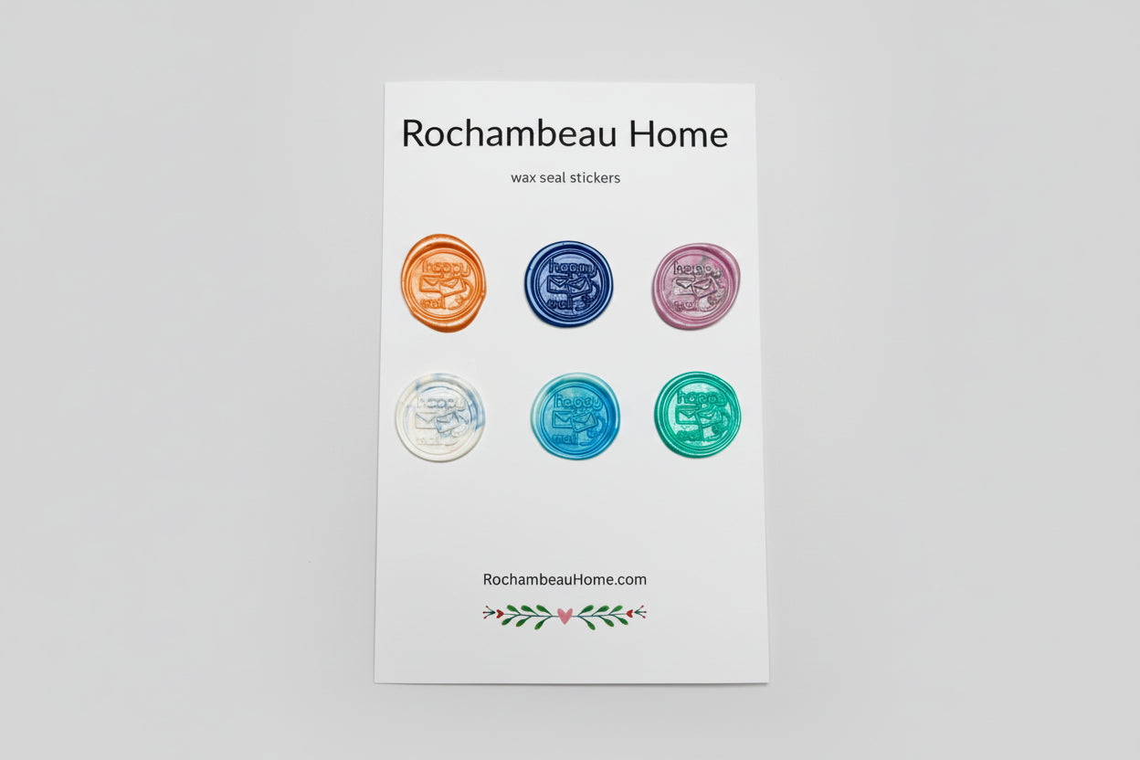 'Happy Mail' embossed was seal stickers created by Rochambeau Home in various colors on a 6 pack card.