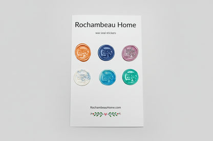 'Happy Mail' embossed was seal stickers created by Rochambeau Home in various colors on a 6 pack card.