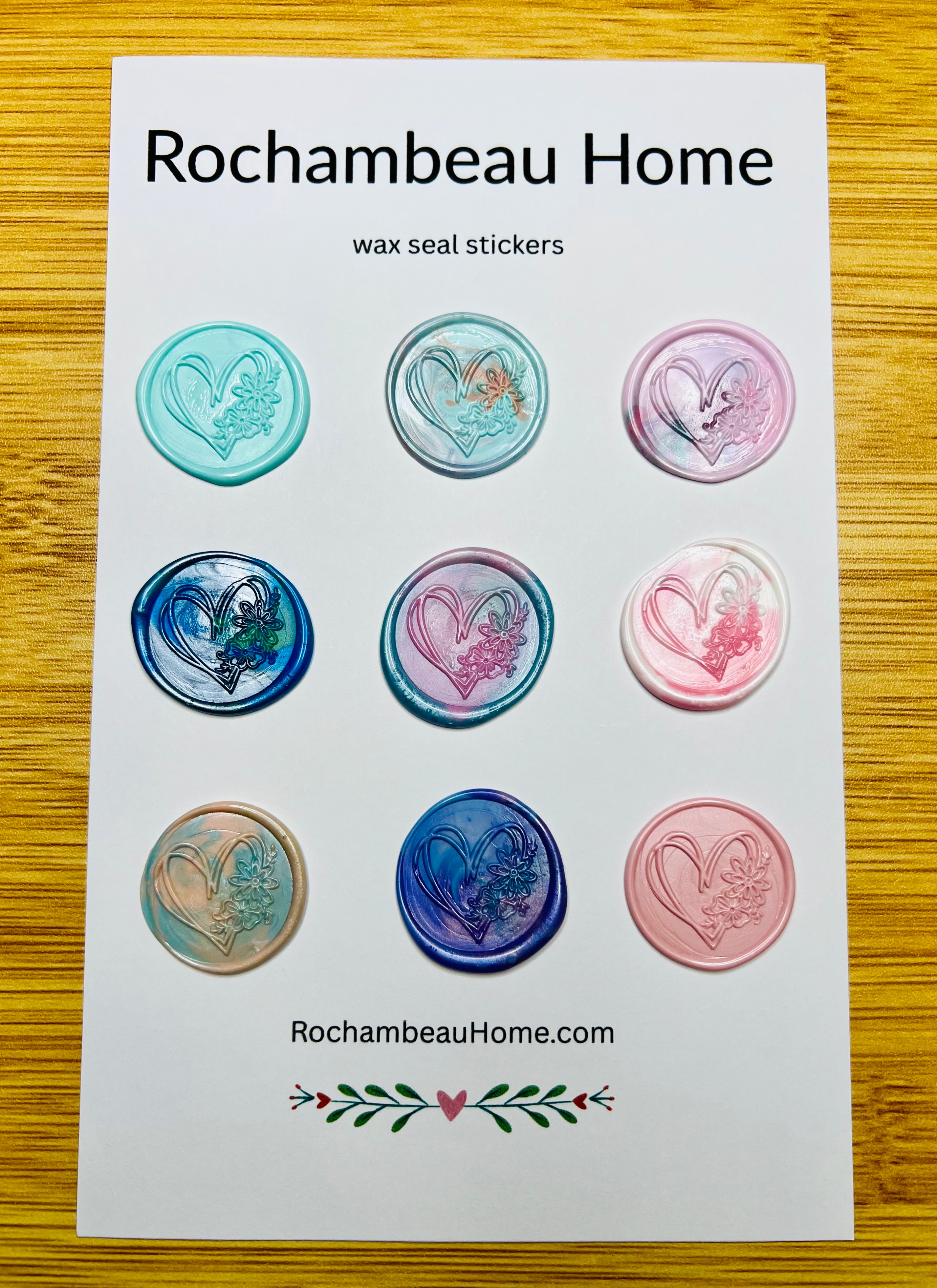 View of the Wildhearted wax seal sticker on a 9 pack card in a variety of colors