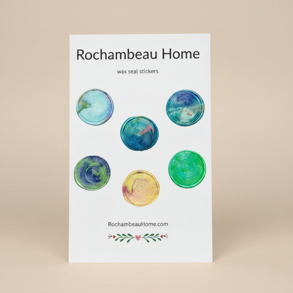 Large 2" multicolor wax seals created by Rochambeau Home with woodgrain tree ring embossing on a display card