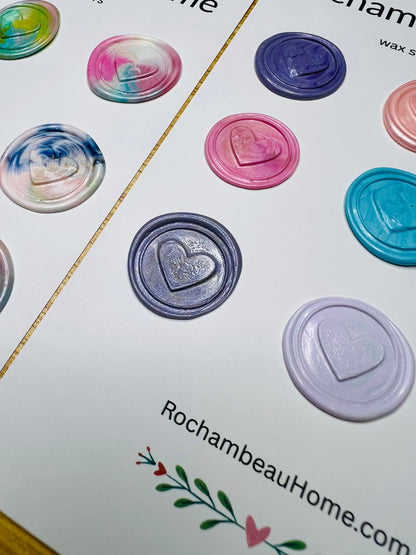 Close up view of the heart stamp in a glittery purple color